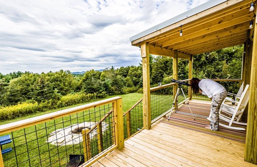 Ashe County Cabin | Tiny, charming mountaintop cottage with large firepit, deck and amazing views