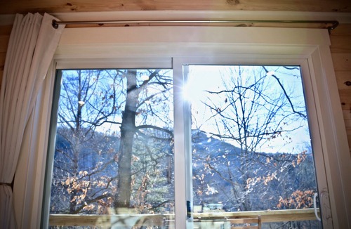 Todd House | Tiny Container Home Retreat with Hot Tub, Fire Table, Dining Area, and Views!