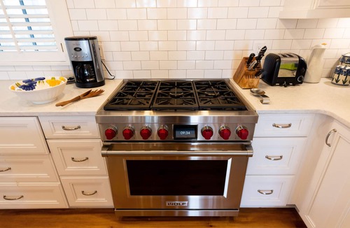 East Beach House | Tipsy Turtle delights with three floors of oceanfront luxury!