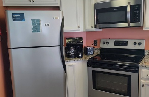 McCutcheon Field Condo | Top floor condo in N. Topsail Beach. Views of the beach & Intracoastal Waterway!