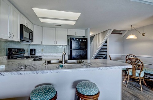 Surf City Condo | Top Floor Condo with Loft - Pool and Ocean Views!