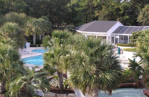 Sea Trail Condo | Top floor with balcony, across from pool & activity center, 4 minutes to beach