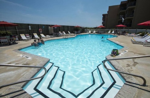 Sneads Ferry Condo | Topsail Dunes 3208| Community Pool | Oceanfront Condo Complex