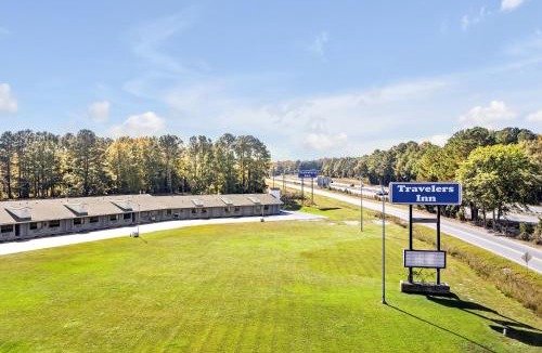 Four Oaks Hotel | TRAVELER'S INN