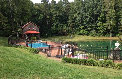 Pittsboro House | Two story cottage on 62 acre Het Landhuis estate