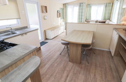 Ferryside Cottage | UNDER CLIFF CARAVAN, family friendly, with pool in Ferryside