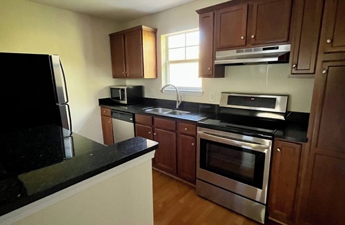 Dilworth Apartment | Unfurnished top floor condo in walkable, tree lined neighborhood