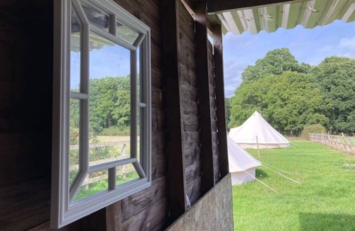 Woodlands RV Rental | Unique Bell Tent Village, sleeps up to 16, fire pit, gin bar