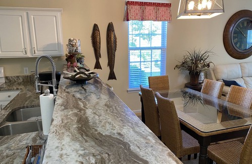 Sunset Beach Condo | Updated ground-level 3 BR/2 BA condo beside pool. Golf, Tennis, and family fun.