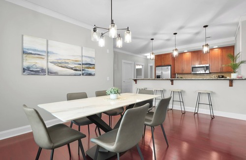 Old West Broad Neighborhood House | Walkable Historic District Stay | 2 Units, Sleeps 14 | The Juliette by AvantStay