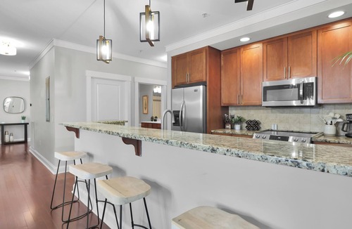 Old West Broad Neighborhood House | Walkable Historic District Stay | 2 Units, Sleeps 14 | The Juliette by AvantStay