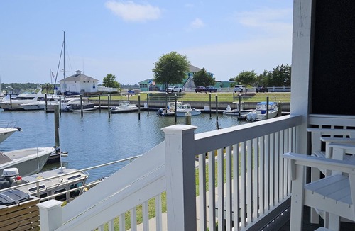 Southport Condo | Water view condo overlooking Marina, with private deck