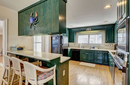 South End House | Waterfront 5 BR home w/incredible views, dock, boat slips, & elevator!