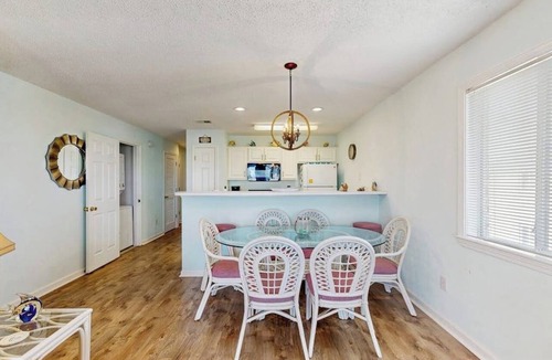 Carolina Yacht Landing Condo | Waterfront condo with pool, private balcony, close to beach & golf