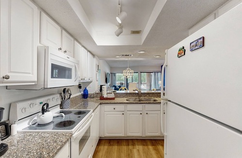 Shelter Cove Condo | Waterfront condo with walkable locale, central AC, washer/dryer, & shared pool