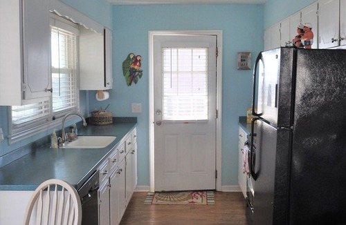 Surf City Cottage | Welcome to The Great Escape, a charming second-row beach house designed for comfort, convenience, and coastal charm.