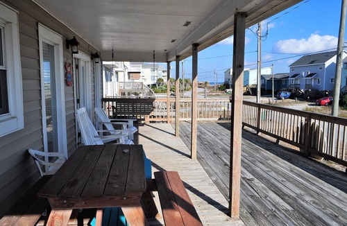Surf City Cottage | Welcome to The Great Escape, a charming second-row beach house designed for comfort, convenience, and coastal charm.