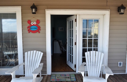 Surf City Cottage | Welcome to The Great Escape, a charming second-row beach house designed for comfort, convenience, and coastal charm.