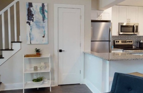 Villa Heights Apartment | West Elm™ Furnished Oasis with Dog-Friendly Back Patio