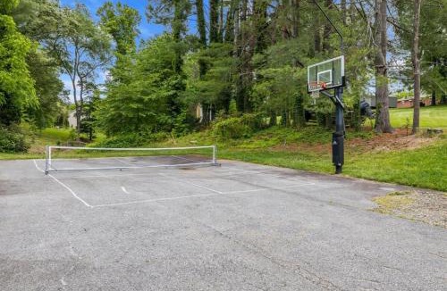 Candler House | Wild West Pool Sportcourt Hot Tub Fire Pit
