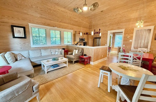 Cape Fear Station House | Wooded Sanctuary- Walk to Sunrise & Sunset Beaches. Dog Friendly. Both clubs!