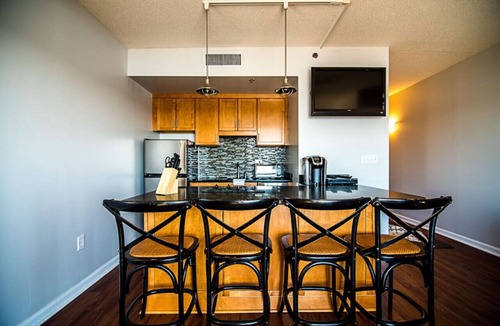 Downtown Wilmington Apartment | WSR-12 Riverfront balcony views.