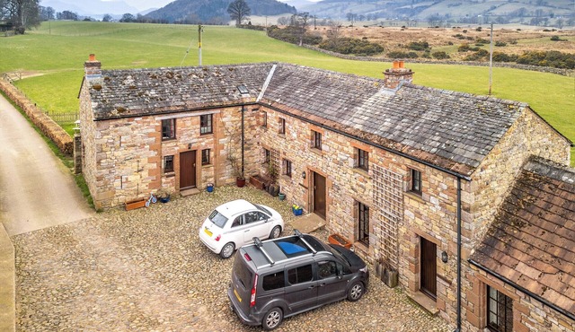 A renovated cottage on a working farm with idyllic views of fells.