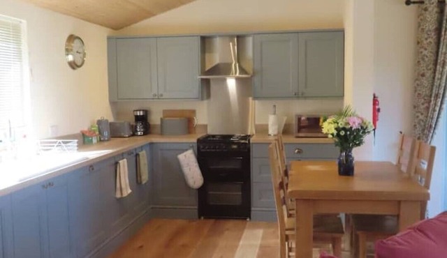 A secluded log cabin lodge with stunning views.