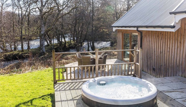 Beautiful river fronted house with private hot tub