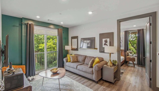 City-view condo with rooftop lounge, gym, & 10-minute walk to downtown
