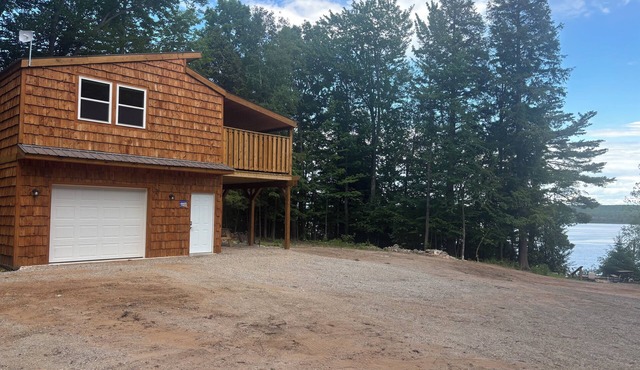 Completely updated one bedroom cabin with a hot tub on AuTrain Lake in Au Train