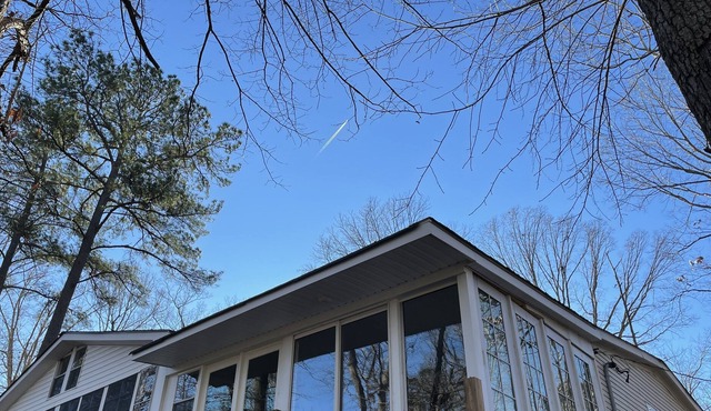 Conveniently located home with large enclosed porch