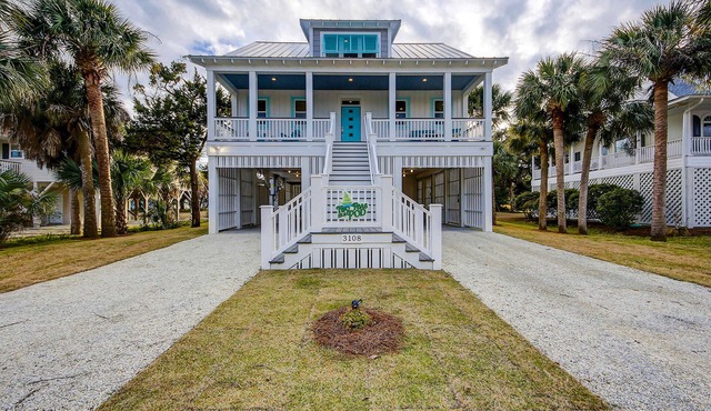Custom home with private pool, elevator & short walk to the beach