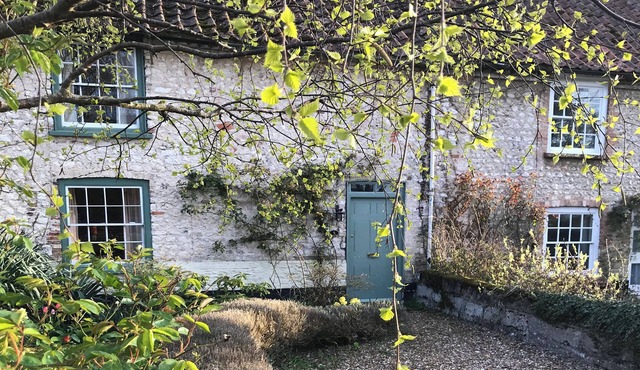 Fantastic character cottage, brimming with charm and set in mature gardens.