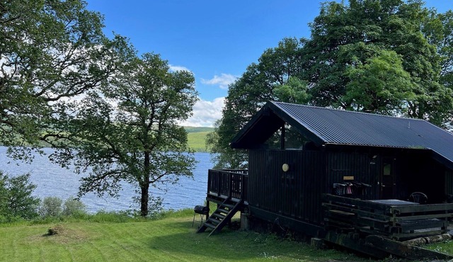 Fyne Cabin is a charming loch side cabin with hot tub & stunning loch views