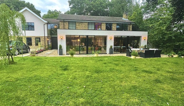 Grand open plan modern home with heaps of light, and close to London