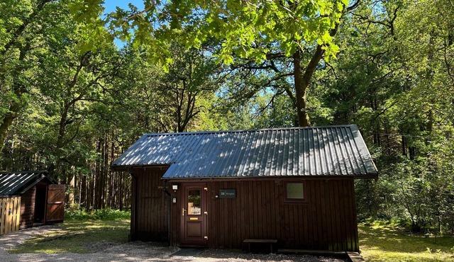 KINGLAS CABIN is in a lovely, peaceful location deep in the forest, with hot tub