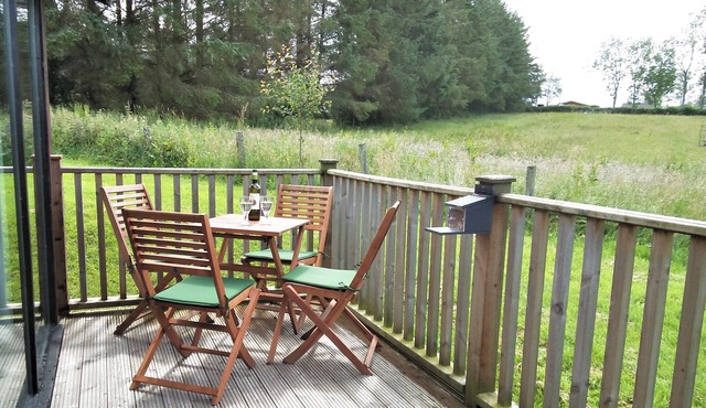 Meadow View Lodge near Greystoke with wood burner and views toward Blencathra.