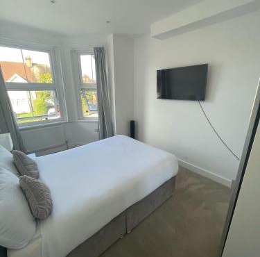 Modern Double Bedroom with Marble private bathroom