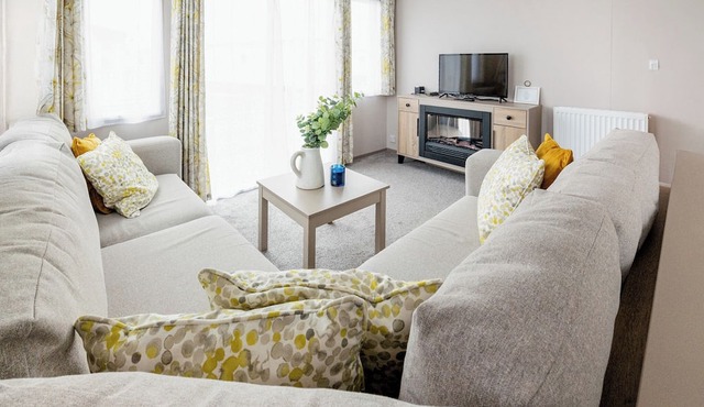 Modern, stylish and spacious 12ft-wide caravan with one double and one twin.