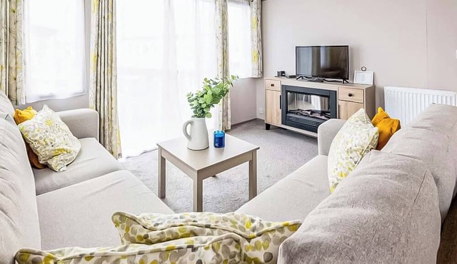 Modern, stylish and spacious 12ft-wide caravan with one double and two twin.