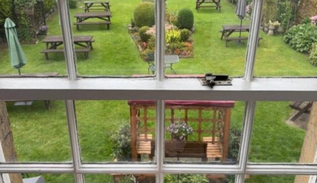Relax and Unwind in Simonburn Bed and Breakfast’s Family Room with Garden Views