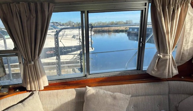 Riverside Boat Retreat on the River Thames