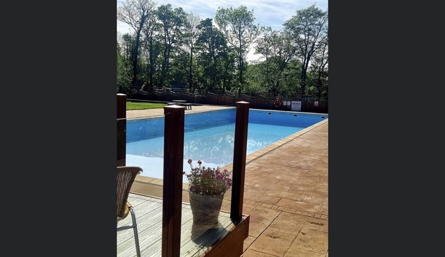 Riverside Cabin with Large Decking Area set in 120 acre Country Park, Snowdonia