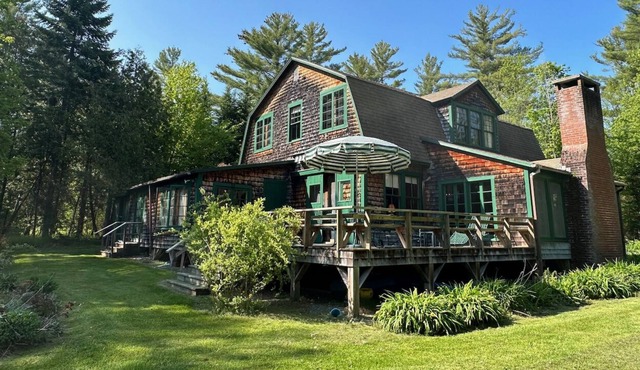 Spacious, rustic getaway on Caspian Lake with two docks & lawn. in Greensboro