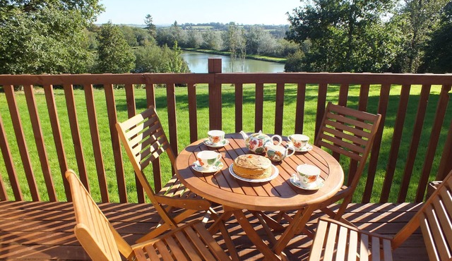 Spacious two-bedroomed fully-accessible lodge with lake view in rural idyll