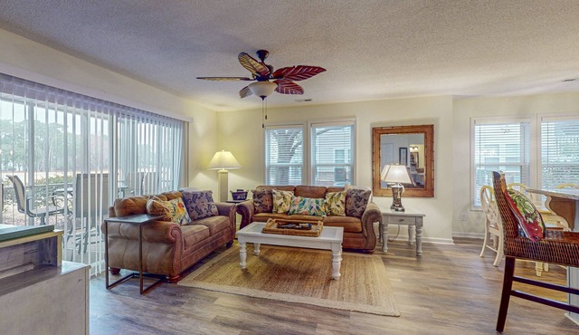 STJ22A: Coastal Condo with golf course view and shared pool access