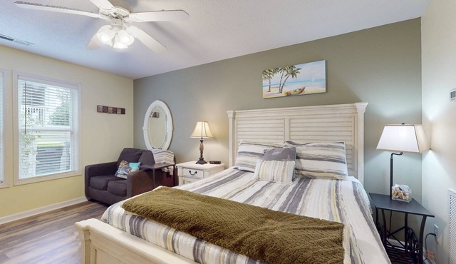STJ22B: Coastal Condo with golf course view and shared pool access