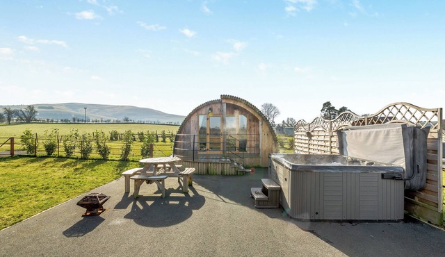 This luxury lodge with a private hot tub is perfect for exploring Mid Wales.