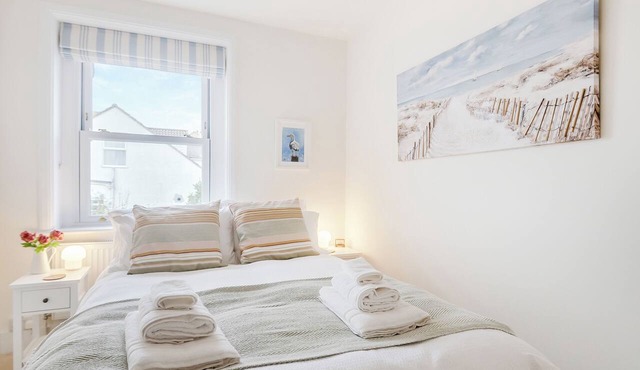 We love this cosy cottage, located just a two minute walk from the beach.